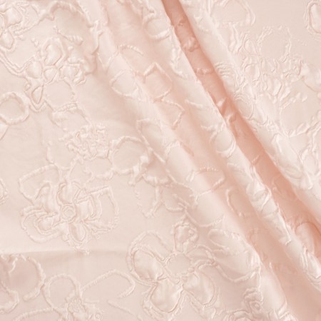 Jacquard relieve floral crema